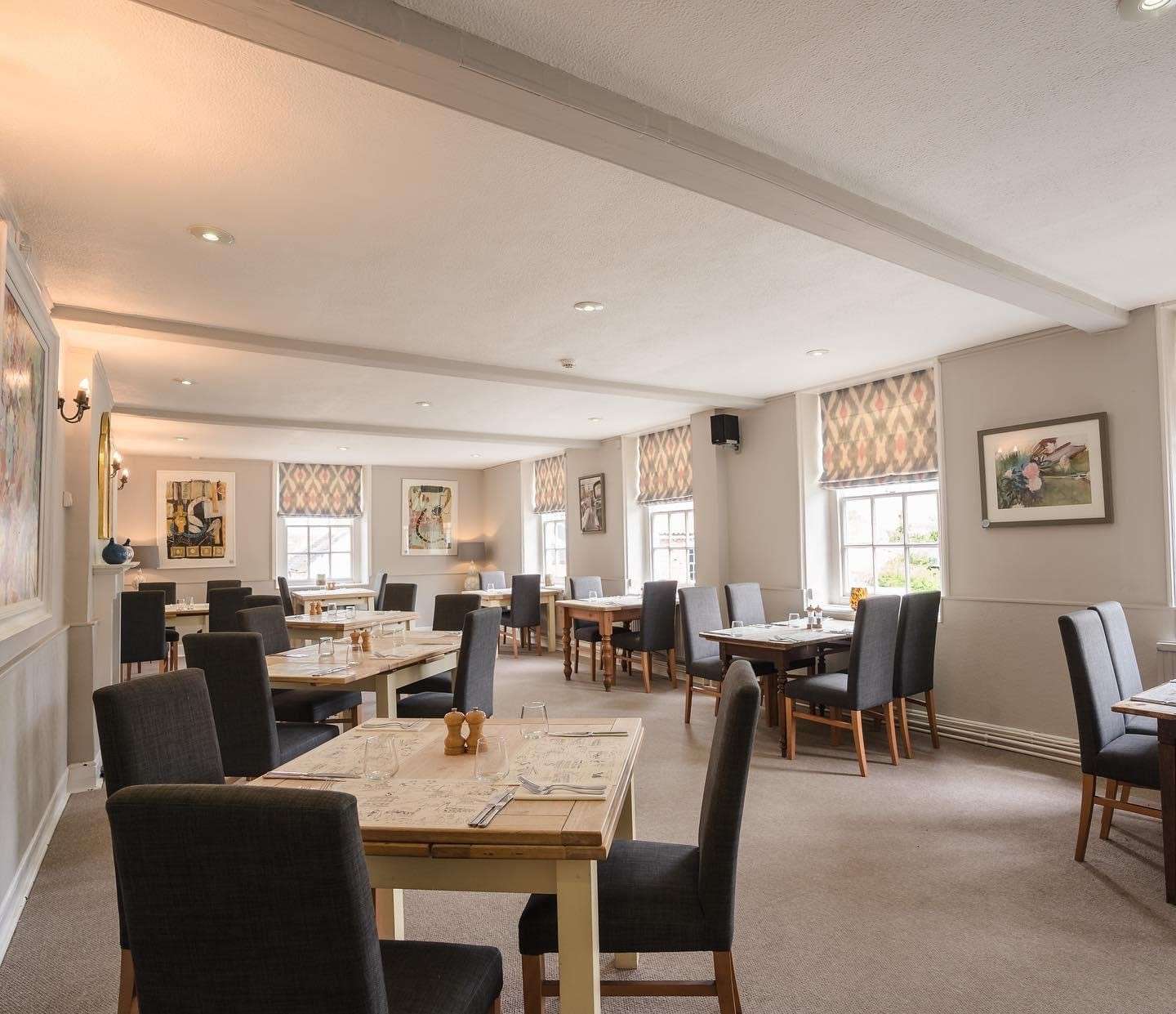 Bright and spacious lounge and dining area at the Swan Hotel Loddon