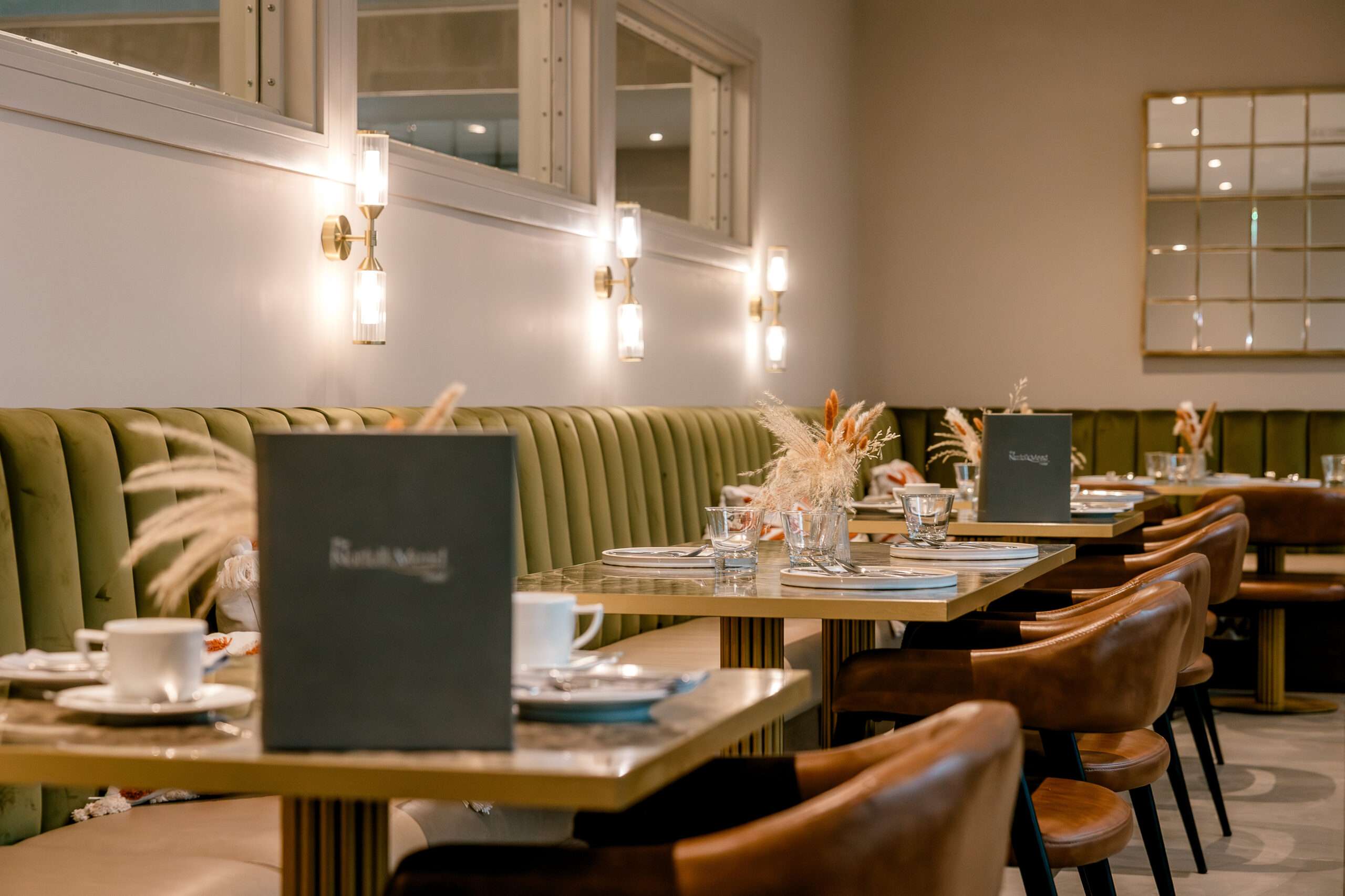 Stylishly presented dining table in the Norfolk Mead Hotel restaurant with contemporary décor.