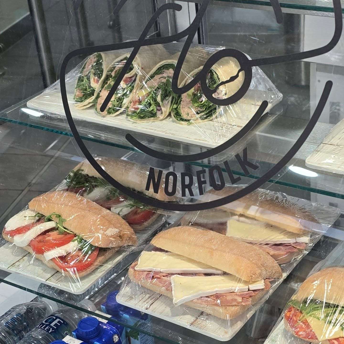 Window display of fresh ciabata sandwiches at Coffee with Flo