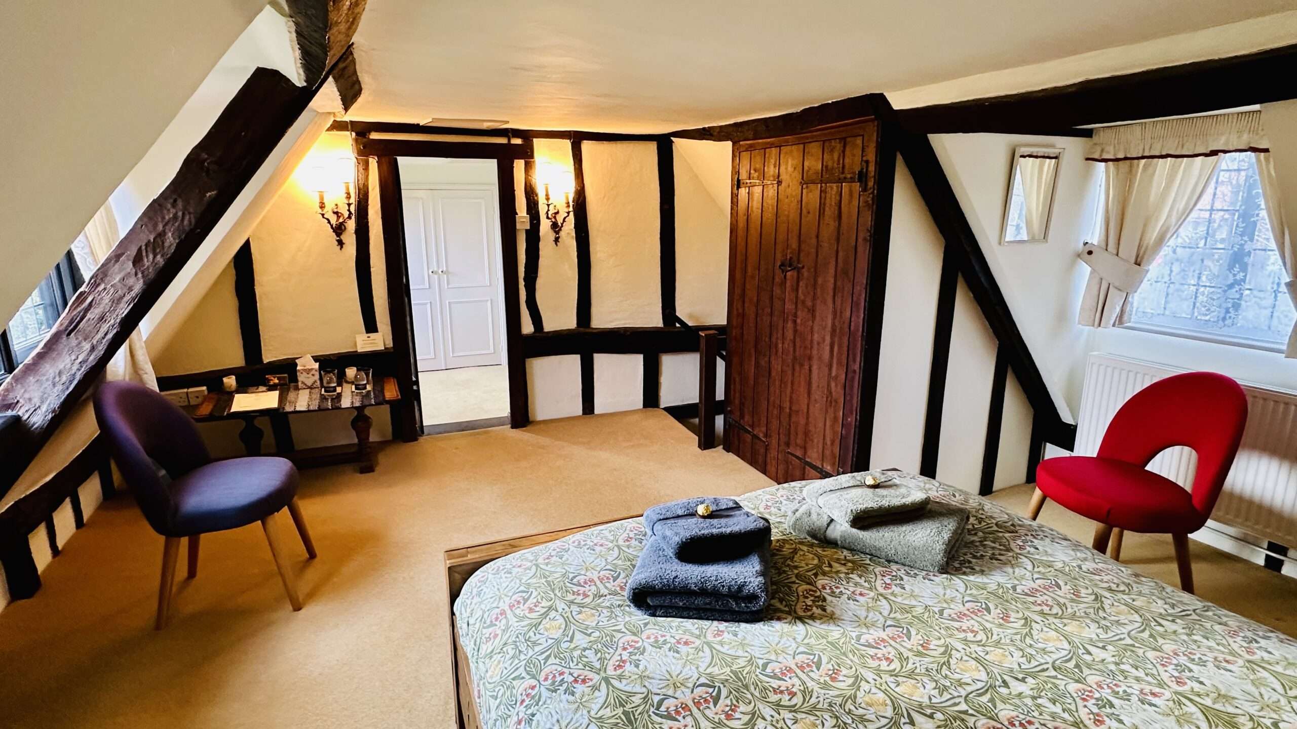 Danegelts B&B Traditional bedroom with exposed timber beams and period features.